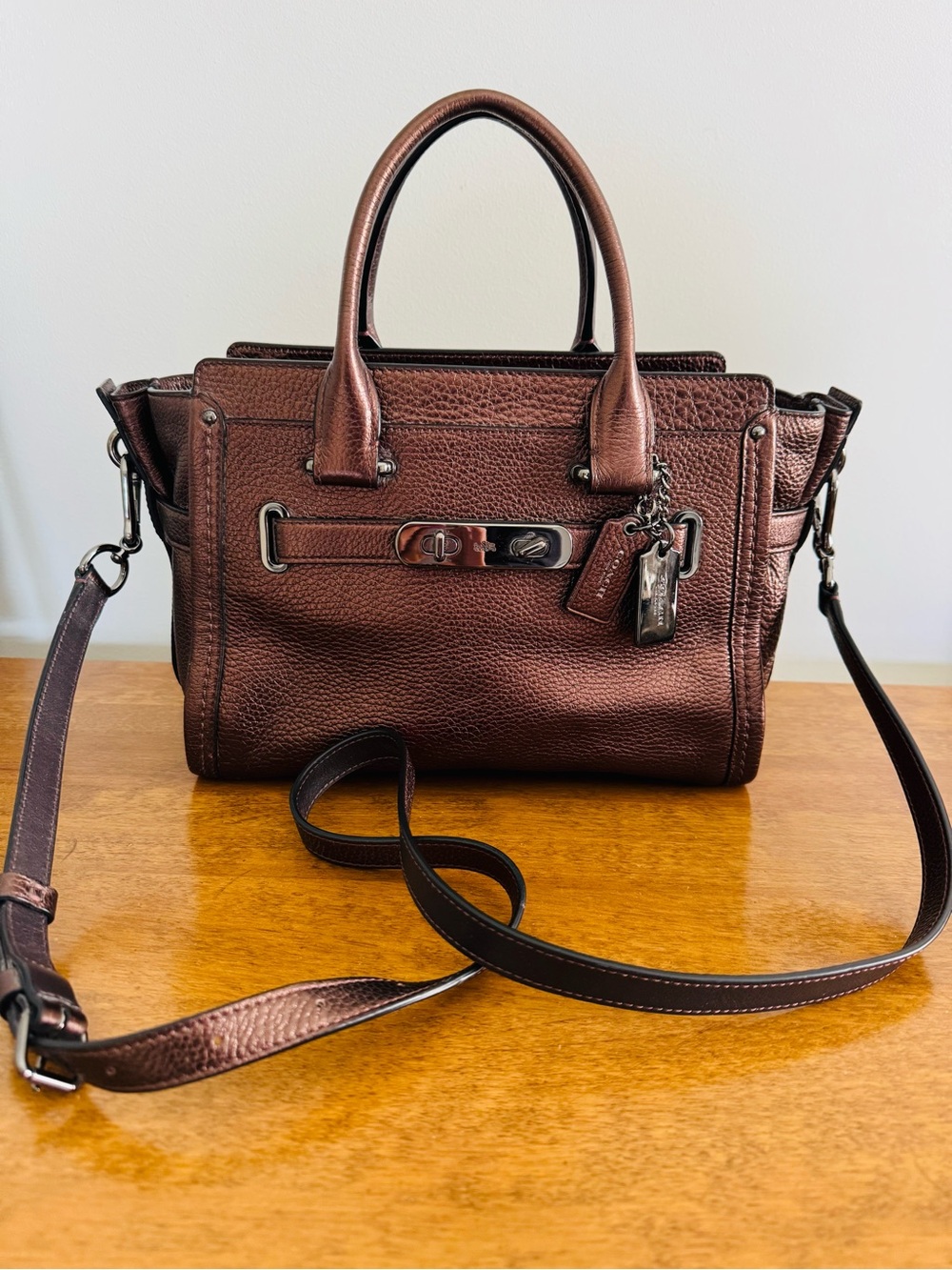 Coach Swagger 27 Metallic Brown Leather Satchel Handbag with Gunmetal Hardware.